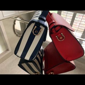 Two new purses- no tags but contains wrapping